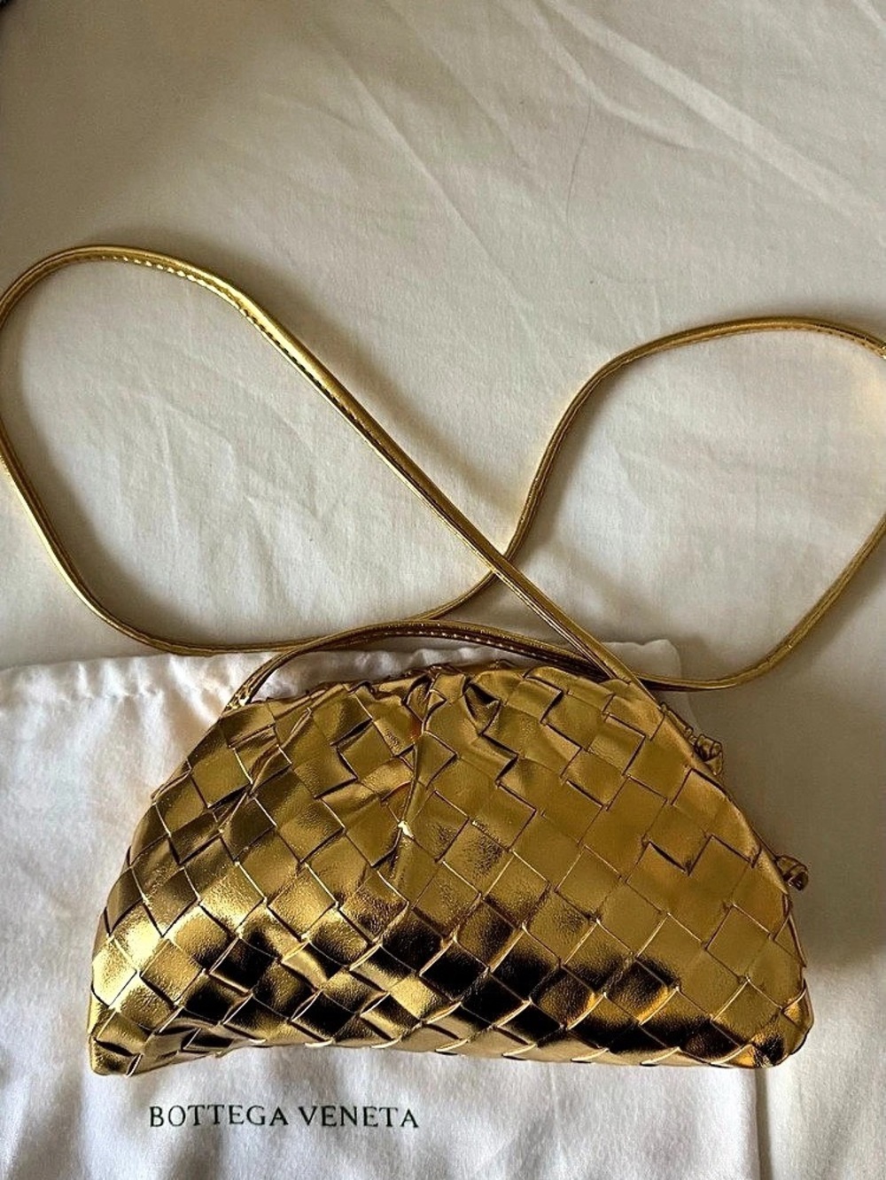 Non authentic Bottega Veneta The Mini Pouch Intrecciato Gold Crossbody Bag